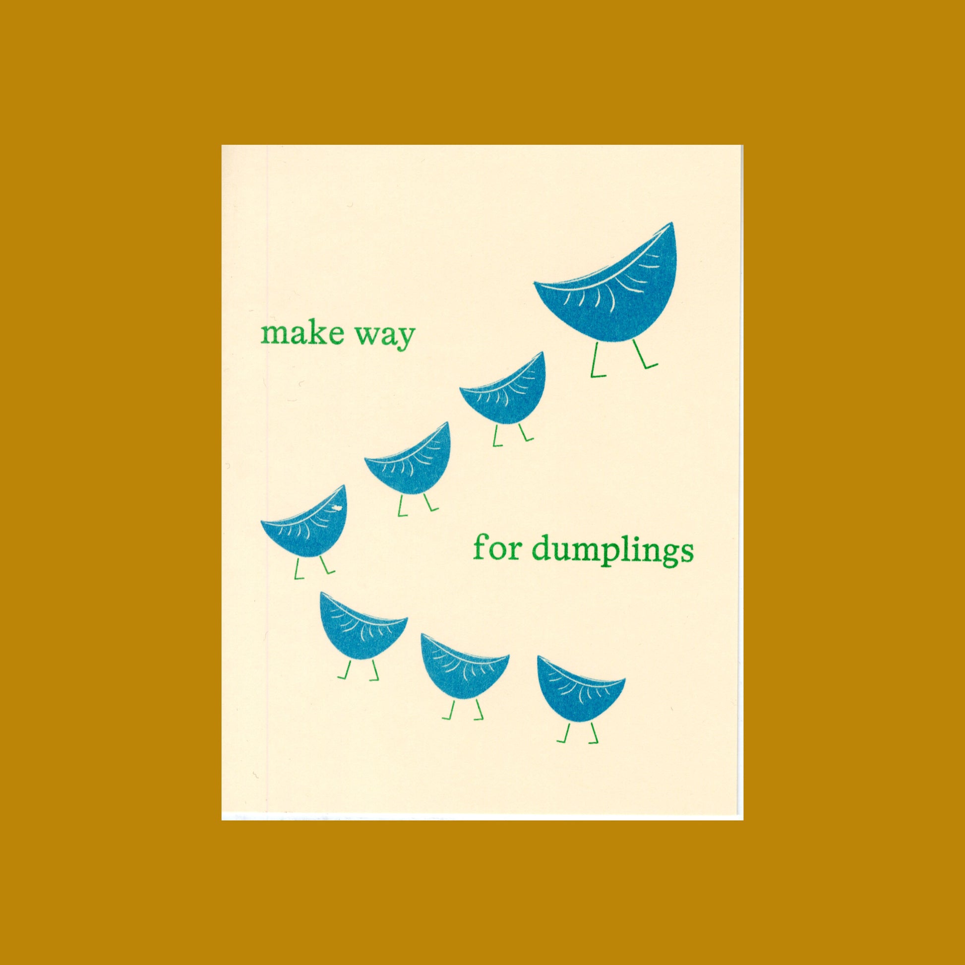 Card with blue dumplings and text 'make way for dumplings' on a beige background
